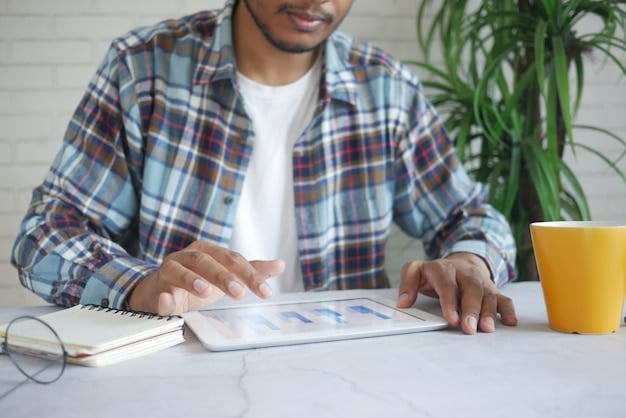A person meticulously working on their budget using the YNAB app on a tablet. The interface should look detailed, with various budget categories and allocated amounts.