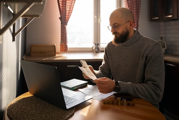 A person sitting at a desk with a laptop, reviewing bills and comparing them with online rate comparison tools. The scene is well-lit, and the person is focused on the task.